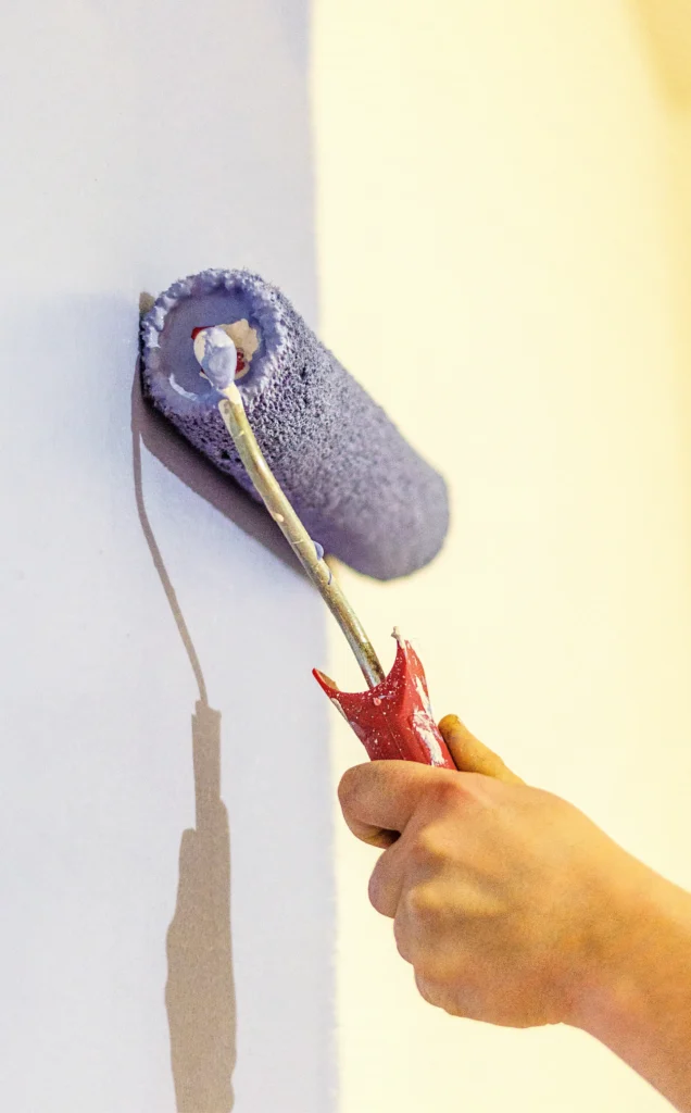 Premium wall painting and finishing work with high-quality paint materials by The RK Infra.